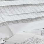 Architectural floor plans and renovation planning documents used to prepare an interior design quotation