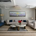 Bright contemporary living room illustrating home renovation planning, seasonal timing and material selection